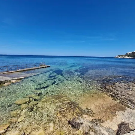 בית נופש Oyster 2 Beachfront Bliss *